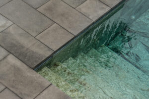 Pool coping paver options in Largo with bullnose and tumbled finishes