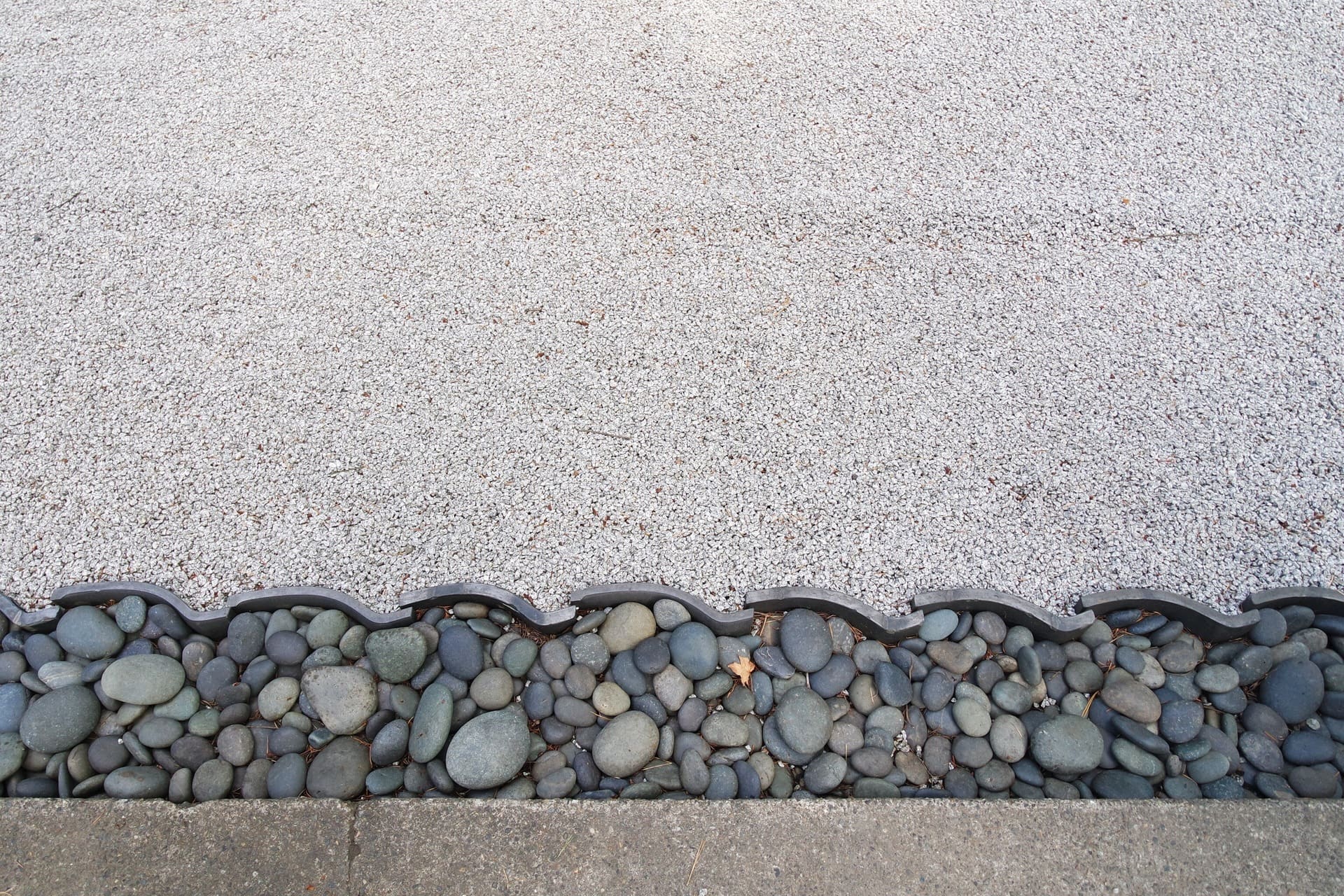 Driveway paver edge restraints in Largo with PVC edging