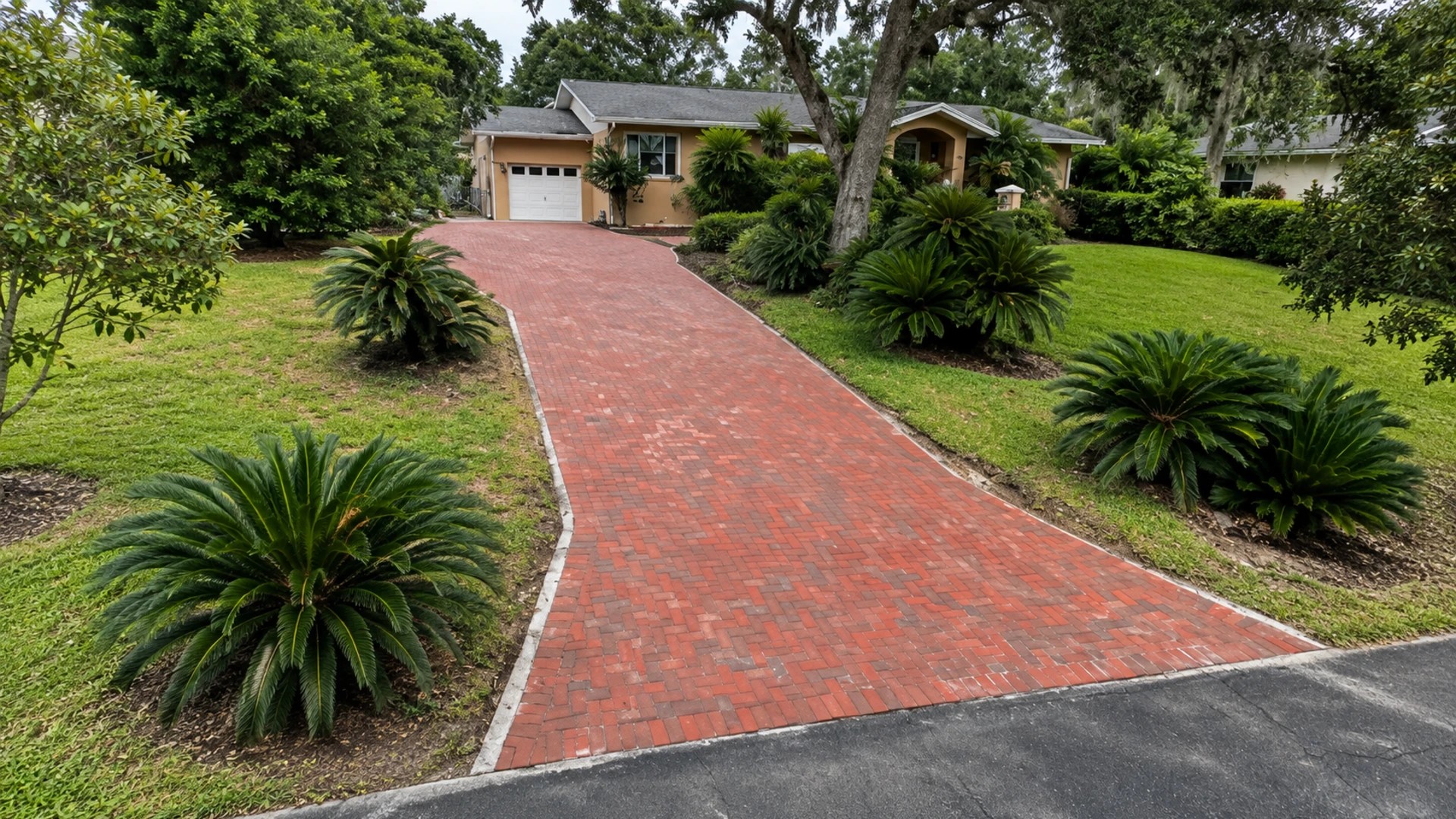 driveway wheel path pavers on a completed JaxTeller Brick Pavers project
