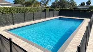 pool deck drainage inspection on a completed JaxTeller Brick Pavers project