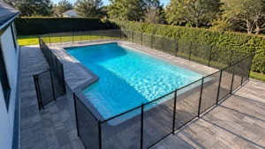 pool deck fence pavers on a completed JaxTeller Brick Pavers project